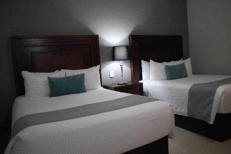 Hotel Suites Mexico Plaza Leon Campestre Værelse billede